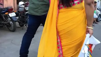 Cute structure of aunty in yellow saree